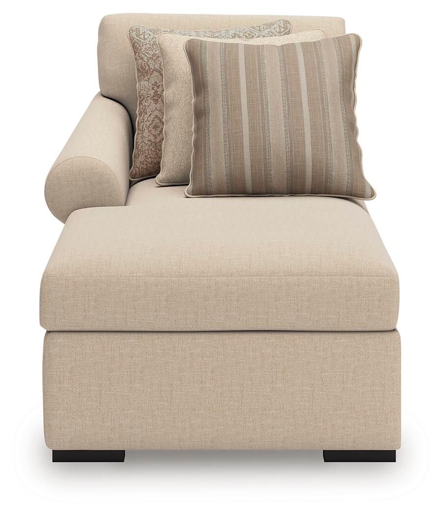 Light beige chaise lounge with three fabric cushions and padded backrest