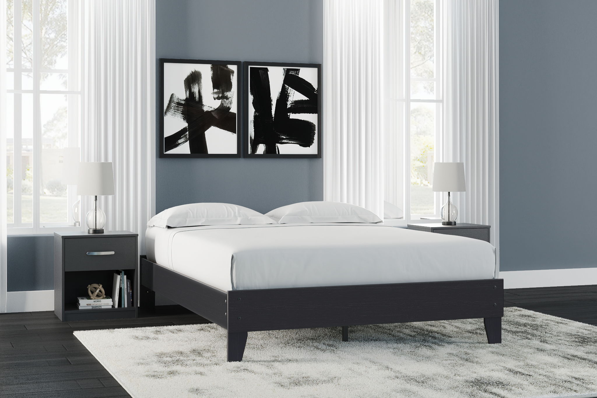 Queen platform bed with black frame and white upholstered mattress, square posts