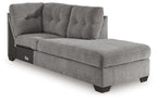 Gray fabric corner chaise with tufted back and track arms