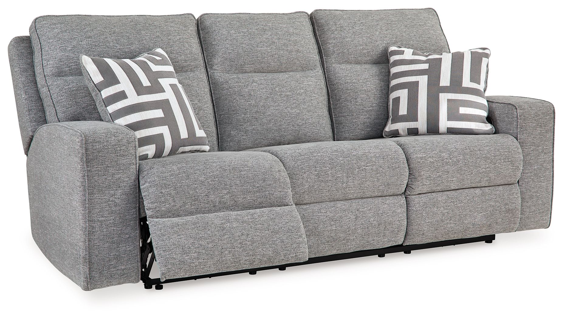 Pewter power reclining sofa in gray fabric with patterned pillows and visible extended footrests
