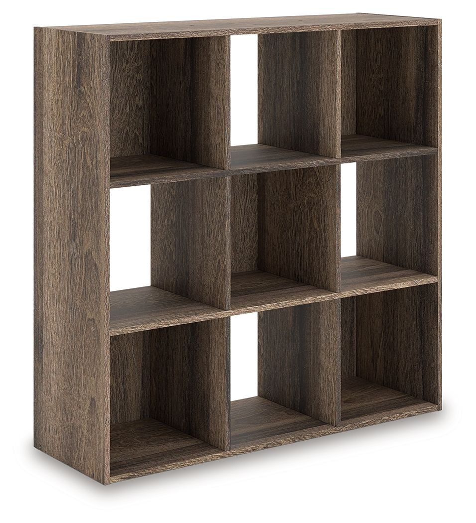 Dark brown cube organizer with multiple open cubbies and a grid of square storage spaces