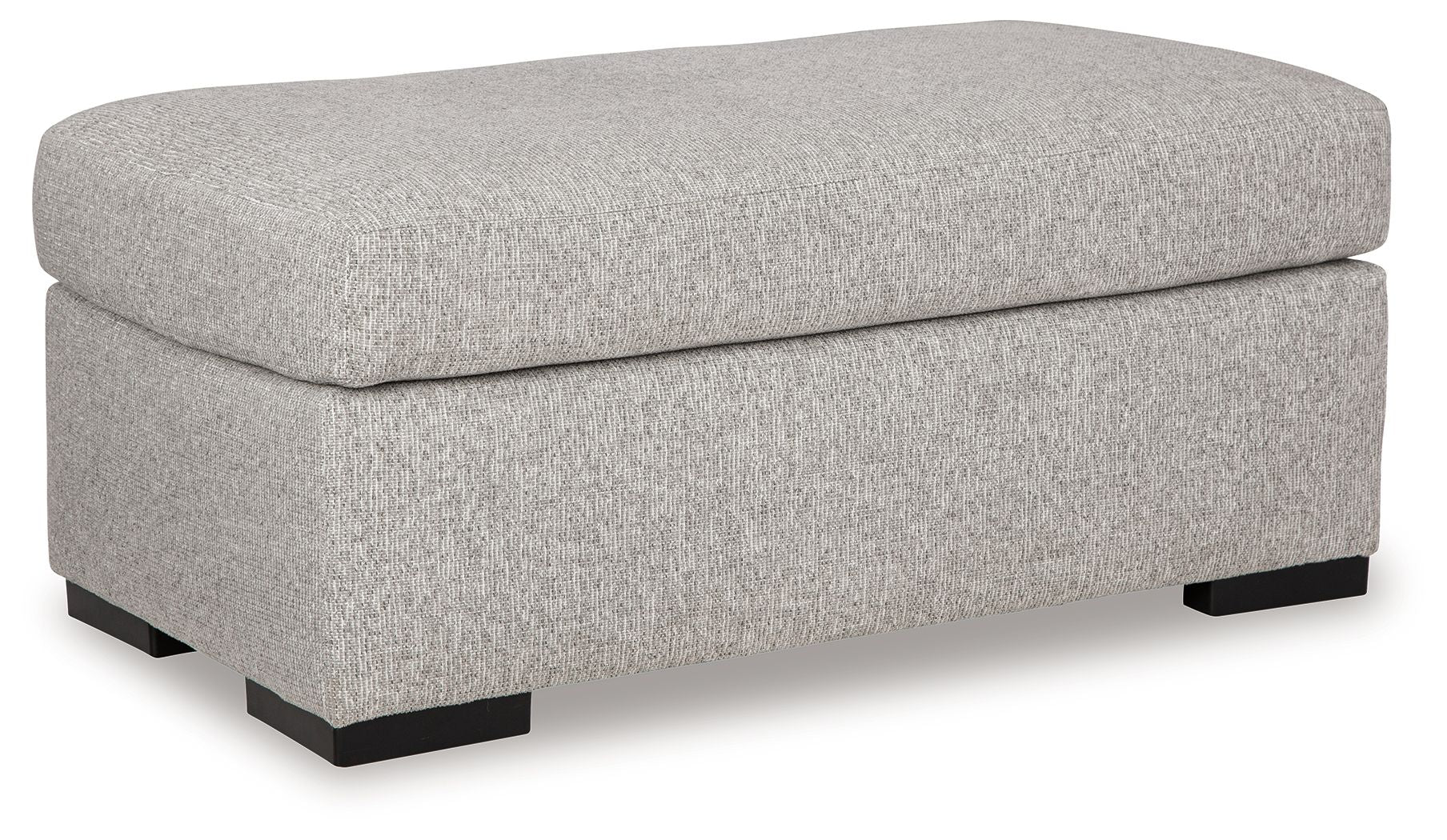 Light gray upholstered ottoman with large cushioned top and square base