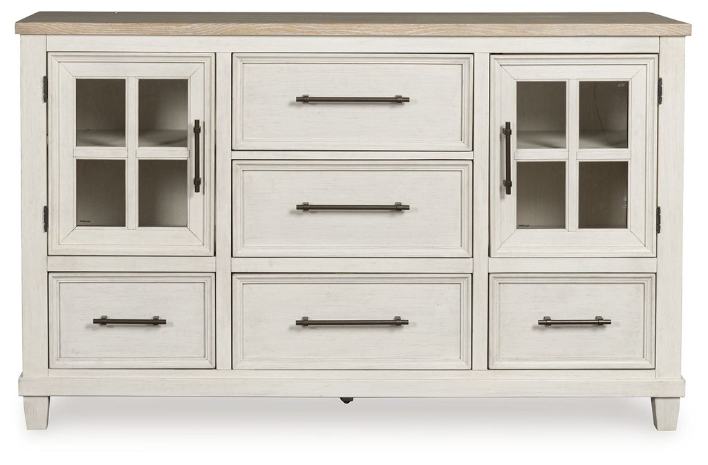 Antique-style dresser in antique white with brown top, side cabinet doors and drawers