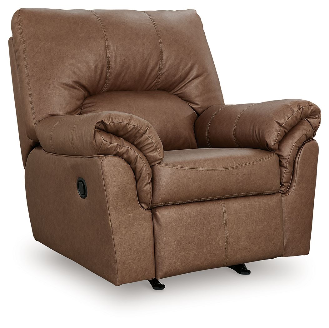 Caramel-brown upholstered rocker recliner with tufted back, curved arms, and wide seat