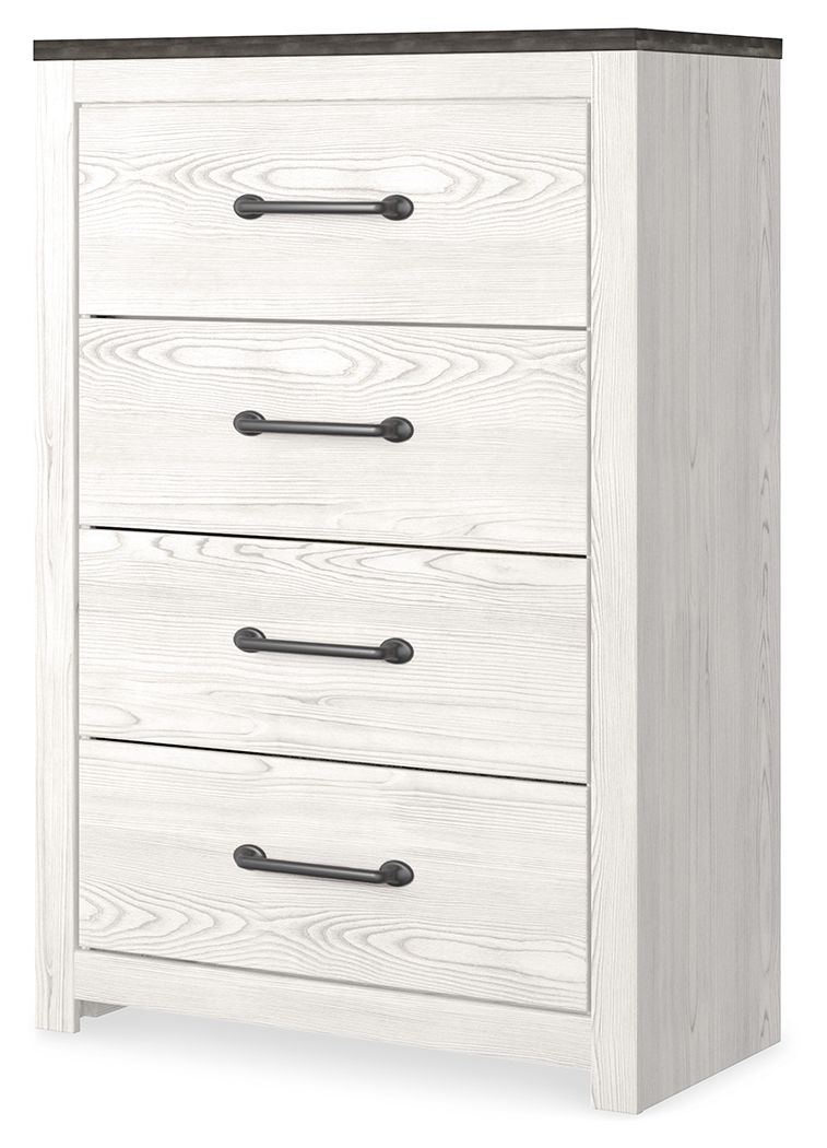 White wood chest of drawers with dark top and four bar pulls