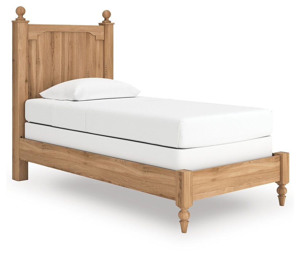 Light brown wooden panel bed with white mattress and pillow, side view