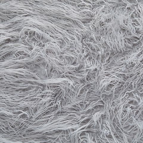 Shaggy faux fur ottoman fabric in light gray with dense, fringed texture