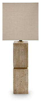 Beige table lamp with rectangular fabric shade and stacked square wood base