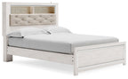 Queen panel bed with white wood frame and light beige tufted headboard