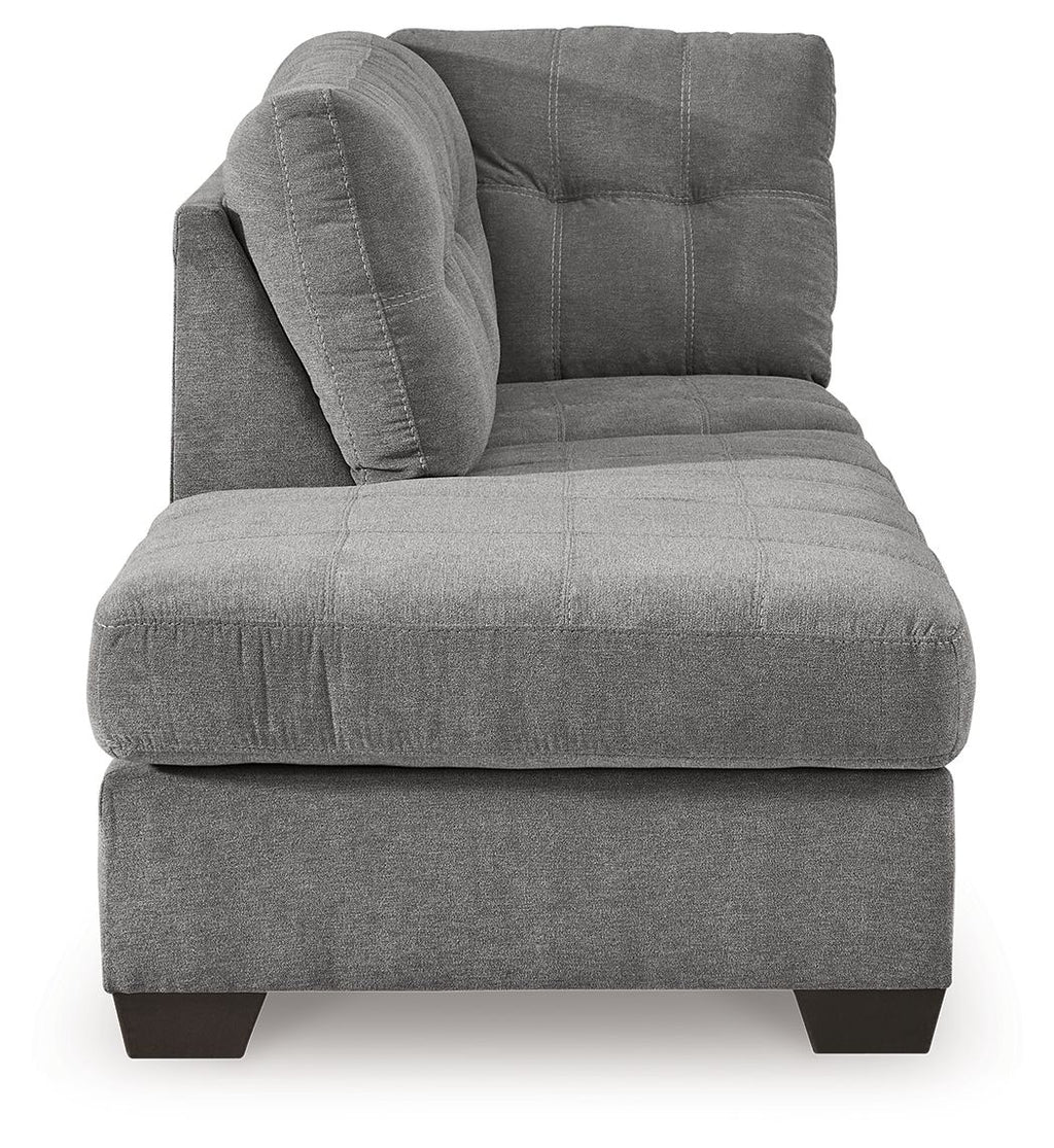 Gray chaise lounge with curved arm, tufted back cushions, and dark block legs