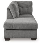 Gray chaise lounge with curved arm, tufted back cushions, and dark block legs