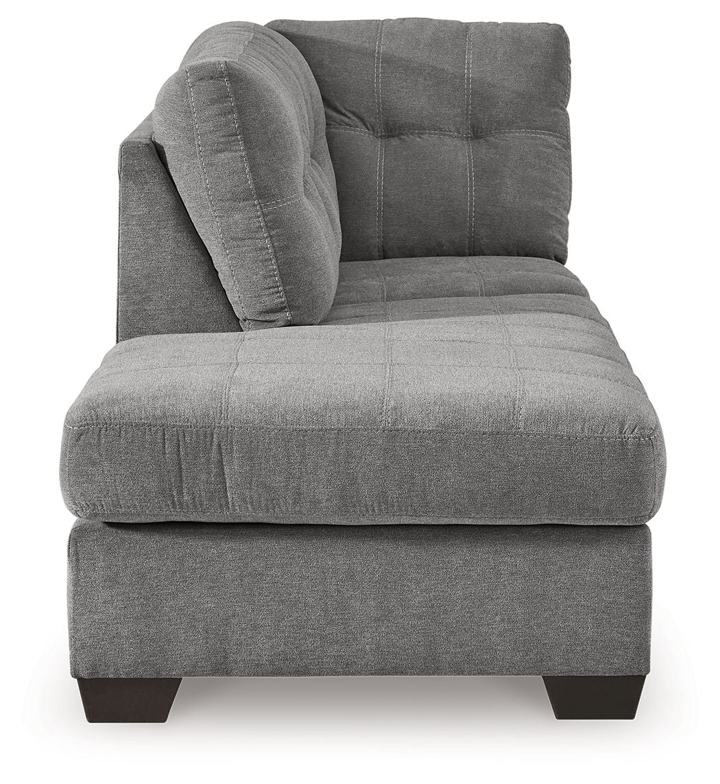 Gray chaise lounge with curved arm, tufted back cushions, and dark block legs