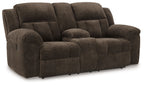 Dark brown double reclining loveseat with padded arms and tufted back cushions