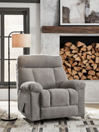 Rocking recliner chair in medium gray fabric, padded arms and recline seats