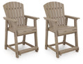 Two Seacliff Beach barstools, medium-brown wood with slatted backs and armrests