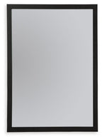 Black bedroom mirror with dark border frame, vertical rectangular shape