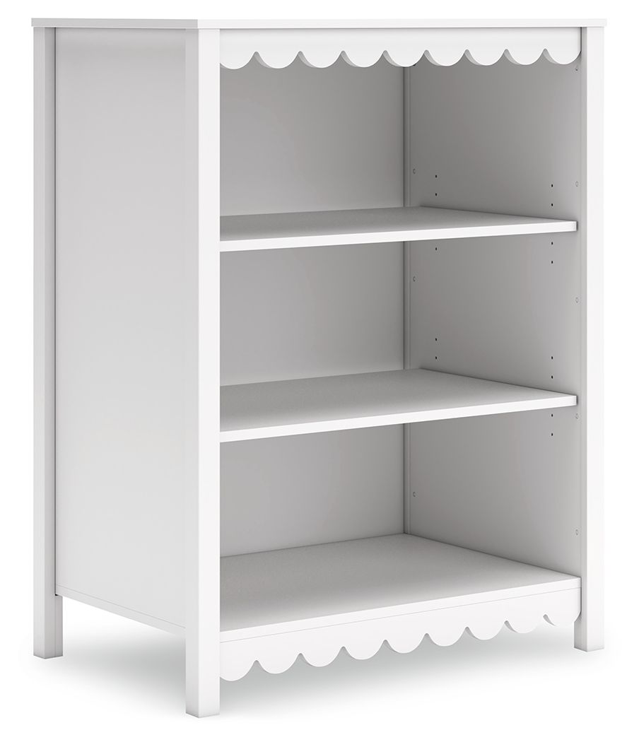 White platform bedroom bookcase with open shelves and scalloped trim