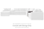 White sectional seating with storage console unit at front right
