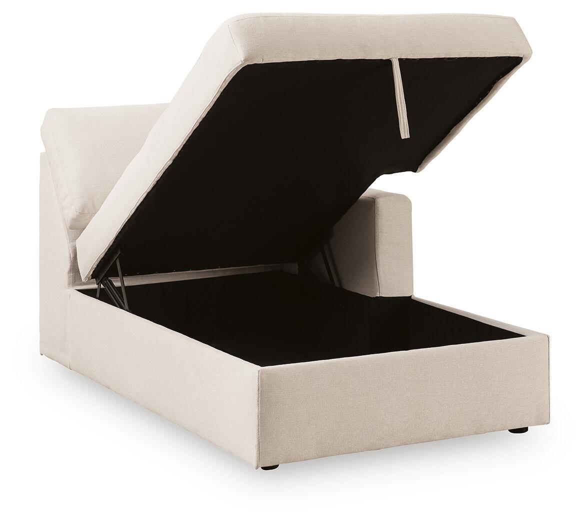 Oyster corner chaise with storage, open lid showing dark interior and hinged base