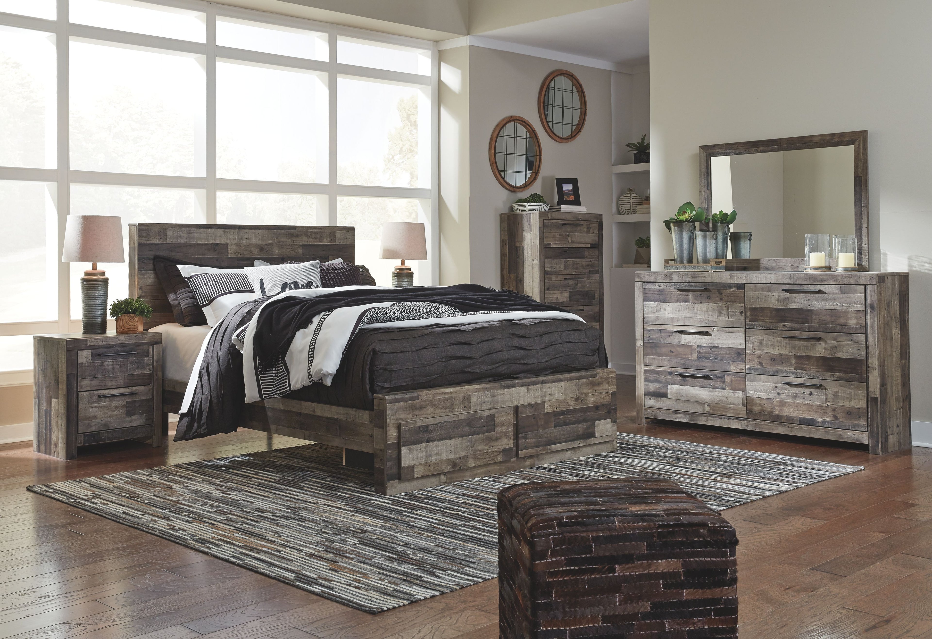 Panel bedroom set with panel bed, nightstands, and dresser with mirror in rustic gray wood.