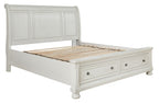 White sleigh bed frame with slatted mattress base and storage drawers