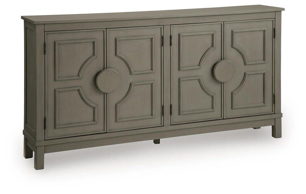 Warm gray accent cabinet with four paneled doors and round knob pulls