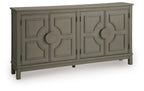 Warm gray accent cabinet with four paneled doors and round knob pulls