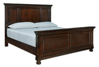 Dark brown panel bed frame with paneled headboard and matching footboard