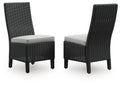 Black outdoor dining side chair with woven rattan-look texture and light gray seat cushion
