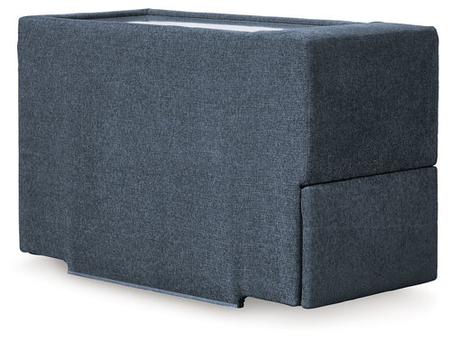 Dark blue fabric console with storage, cushioned top and side compartment