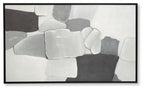 Framed abstract wall art showing layered gray blocks on white, black frame