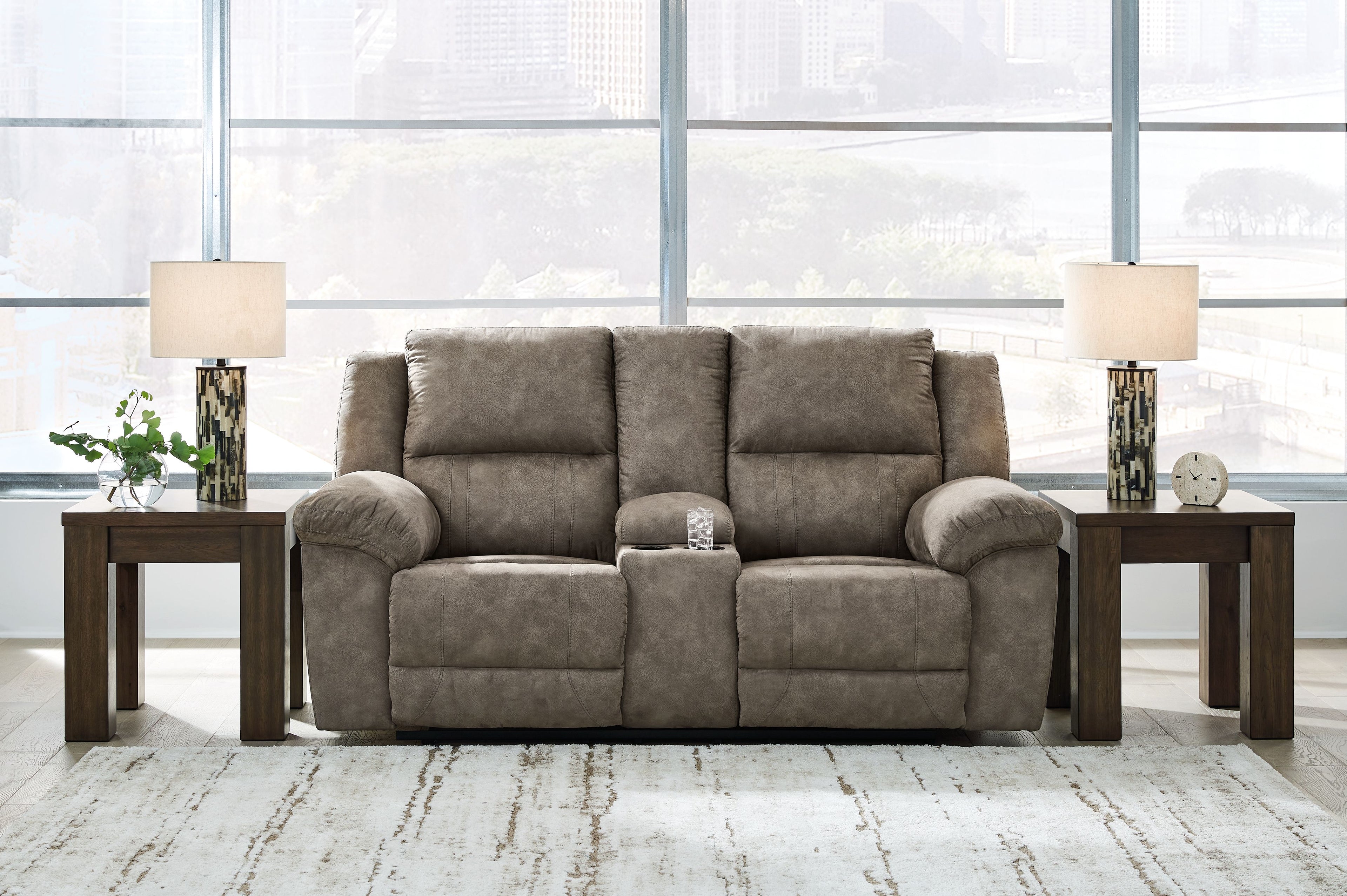 Reclining loveseat with center console, dark gray fabric, wide seating with recline arms