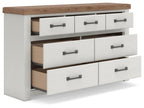 White dresser with wood top and open side drawers, dark bar pulls