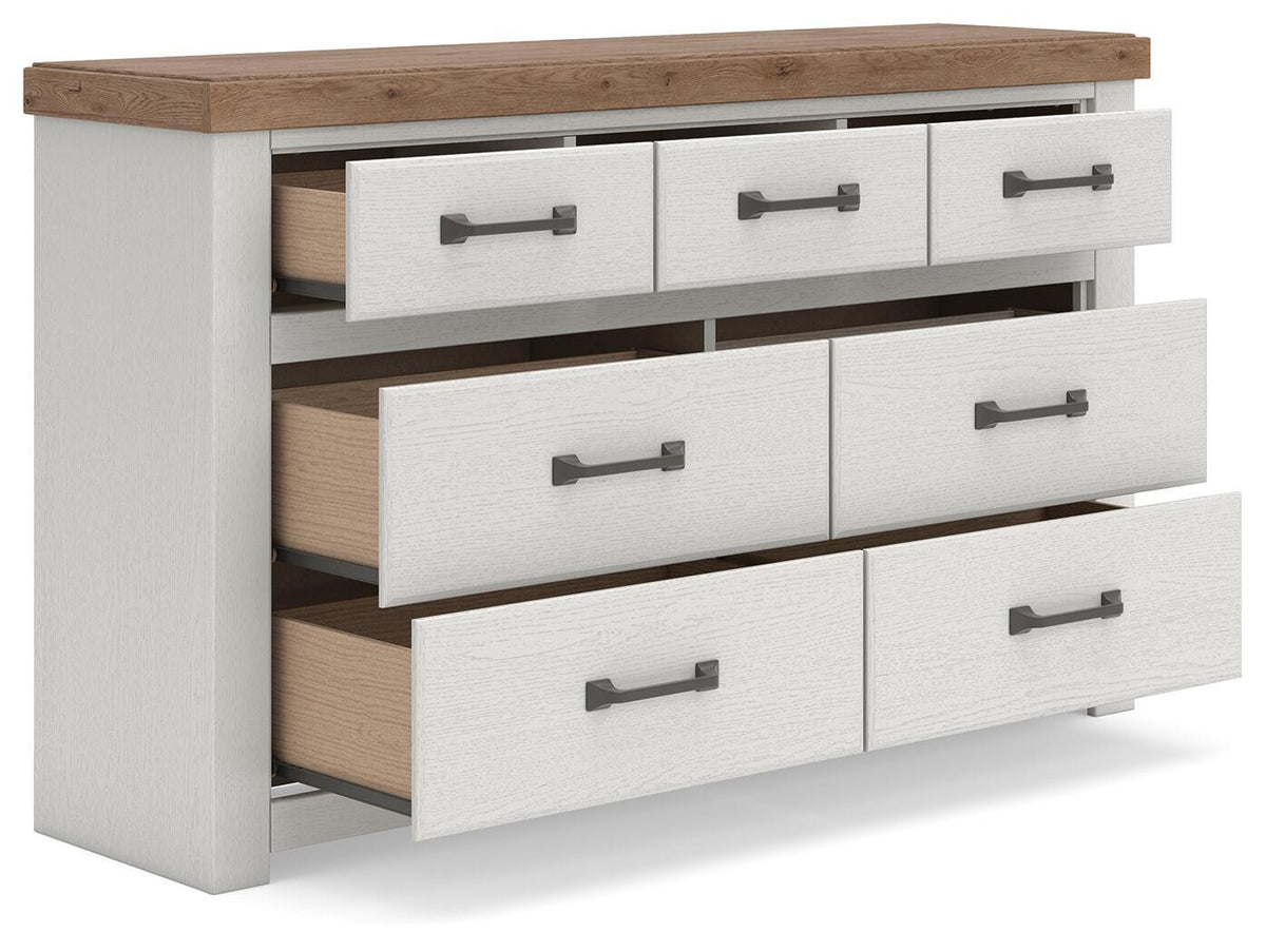 White dresser with wood top and open side drawers, dark bar pulls
