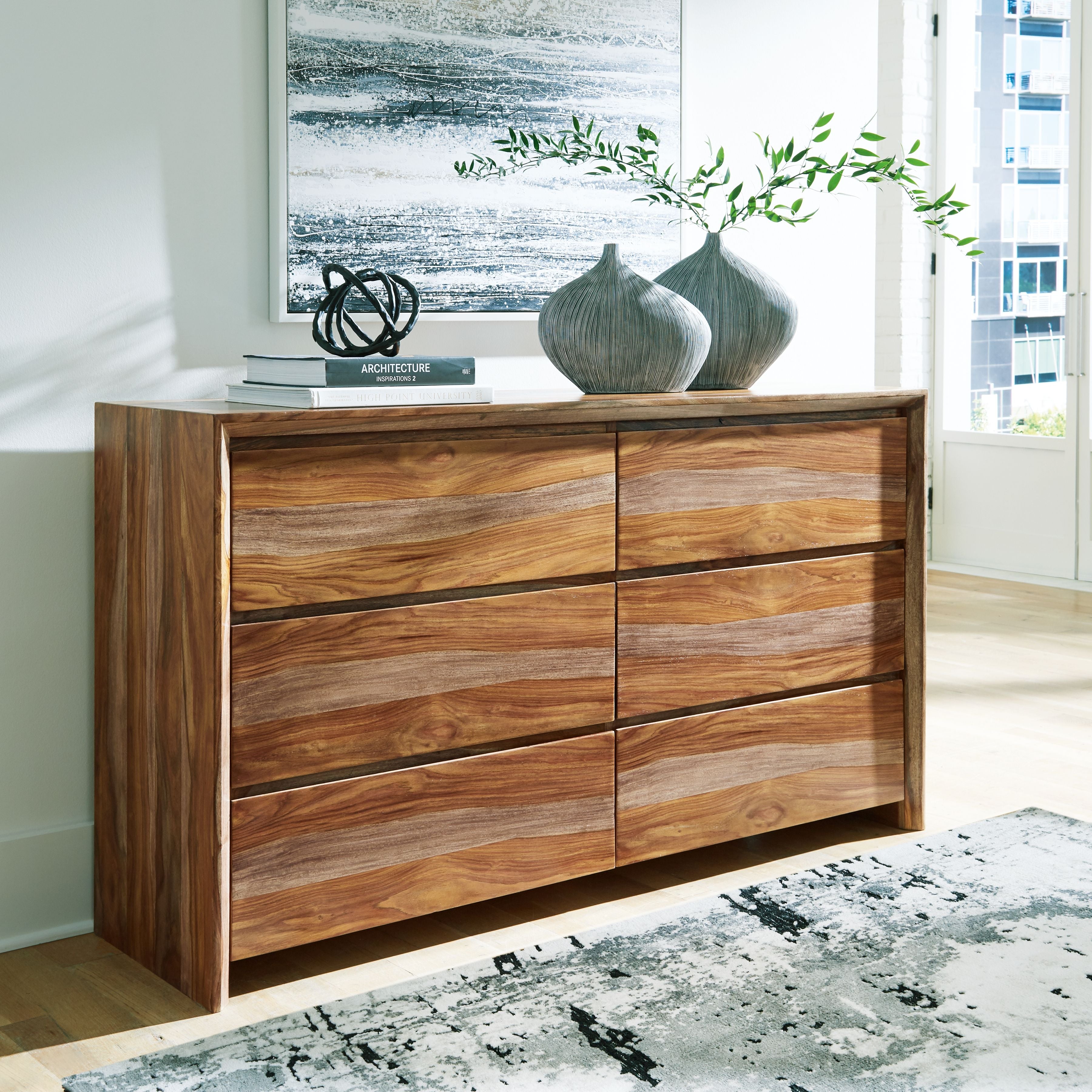 Brown wooden dresser with six drawer fronts in two vertical columns