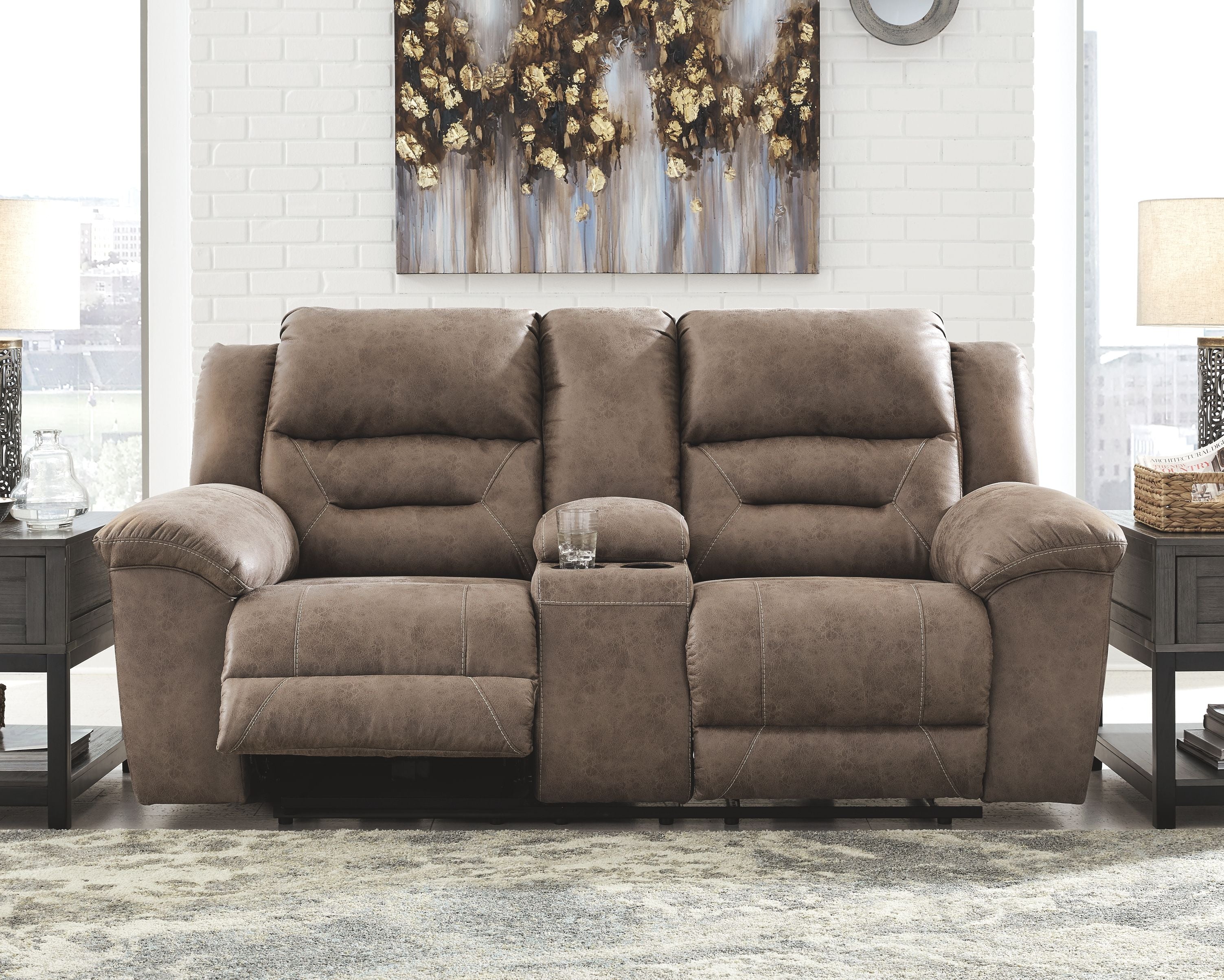 Stoneland power reclining loveseat in medium brown fabric, padded backrest and wide armrests