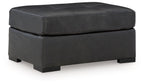 Oversized accent ottoman in dark gray with padded top and squared legs