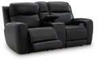 Black power reclining loveseat with console and adjustable headrest, reclined seating