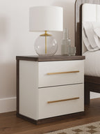 Kendanport two-drawer night stand in white with brown top and two gold-tone bar pulls