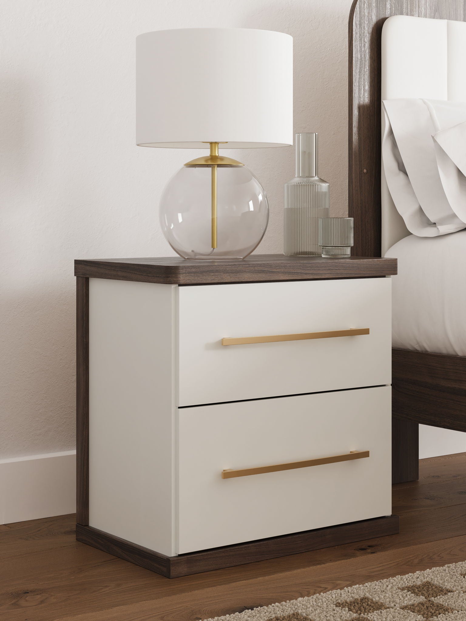 Kendanport two-drawer night stand in white with brown top and two gold-tone bar pulls