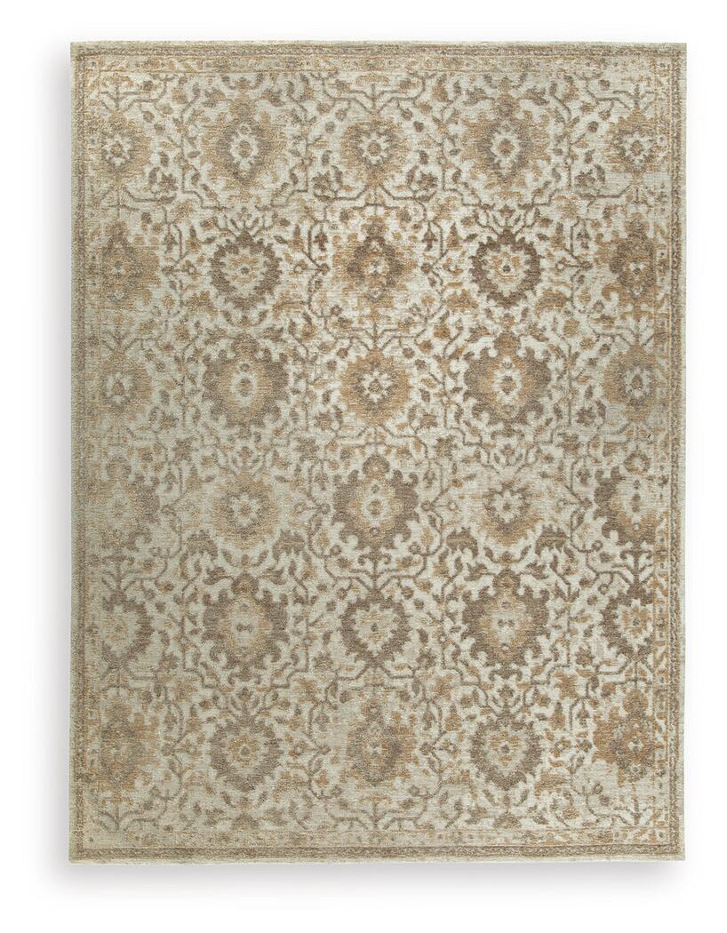 Light brown patterned area rug with repeating medallion florals and border