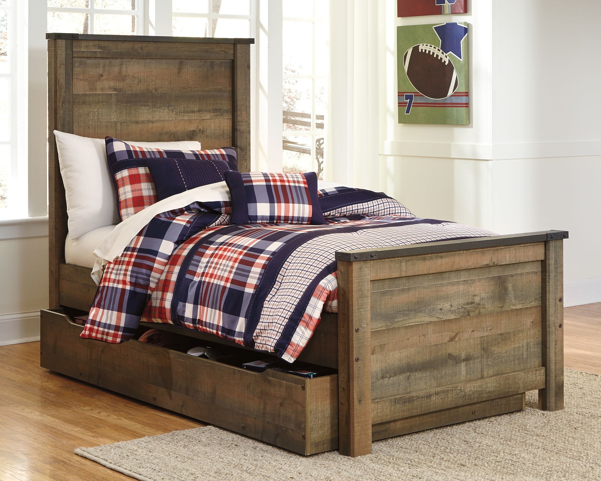 Dark brown panel bed with paneled headboard and plaid bedding, low side view