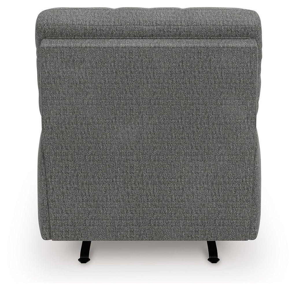 Gray upholstered recliner back view with rounded top and black legs