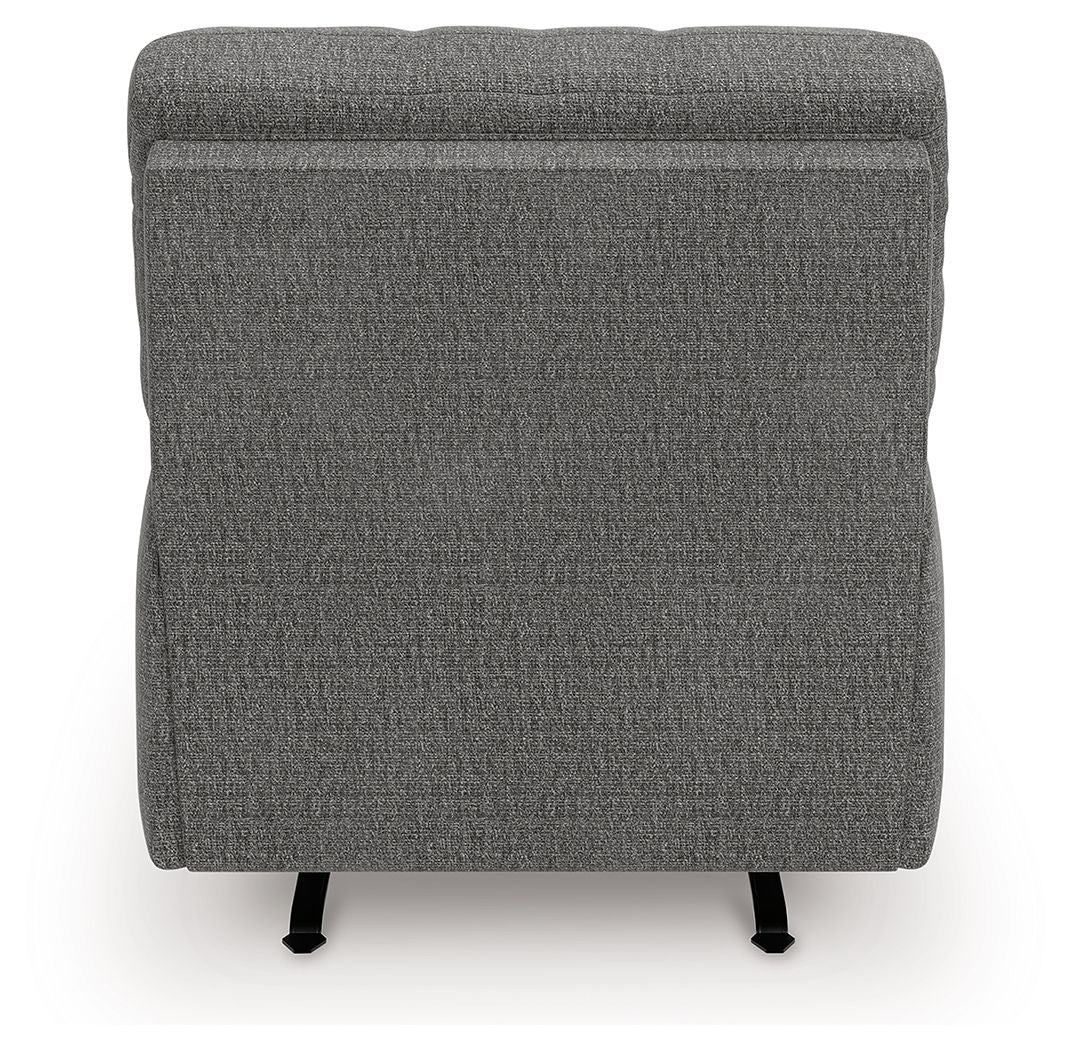 Gray upholstered recliner back view with rounded top and black legs