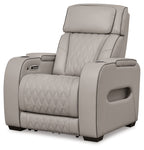 Gray power recliner with padded adjustable headrest and diamond-quilted seat back