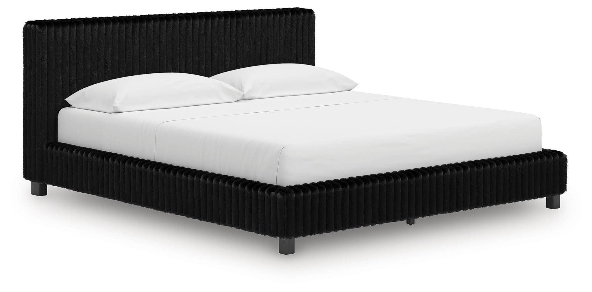 Black upholstered platform bed with tall headboard and neatly placed pillows.