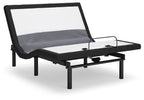 Adjustable bed base with lumbar support and audio, dark frame, raised head and cable on platform