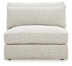 Armless chair in light speckled fabric with tall back cushion and dark feet