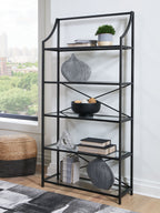 Antique black bookcase with five open shelves and curved uprights
