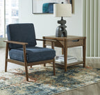 Blue accent chair with upholstered seat and back, dark wood arms and legs